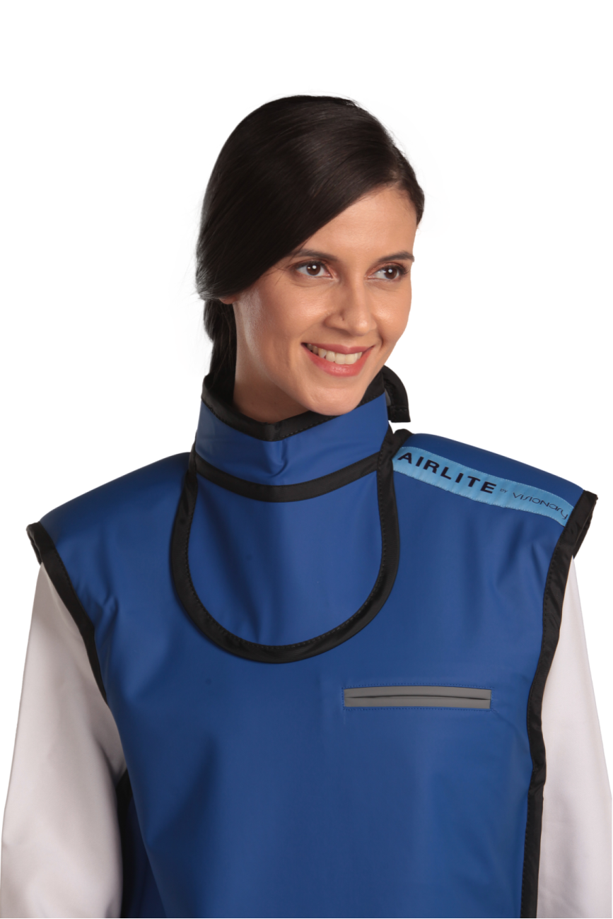 Half-length frontal view of a female model wearing an electric blue, grey-lined coat apron with an integrated thyroid collar. 