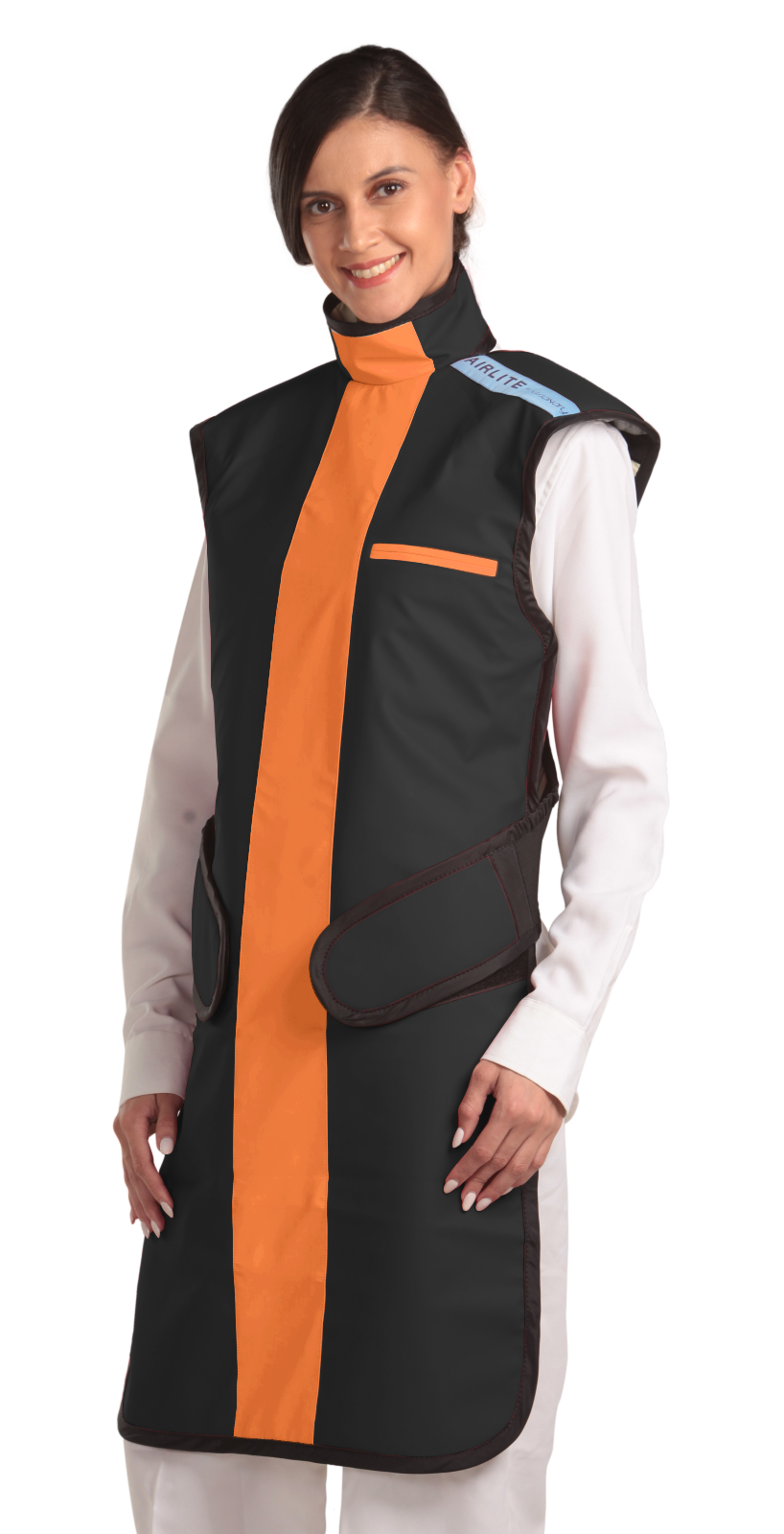 Frontal left-side view of a female model wearing a coat apron with an integrated thyroid guard. The apron is jet black with a tangerine-colored center line and has velcro fasteners by the sides.