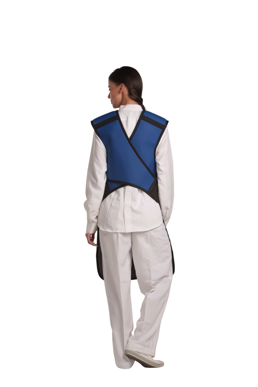 A full back view of a female model wearing an electric blue, grey-lined coat apron with flex back.