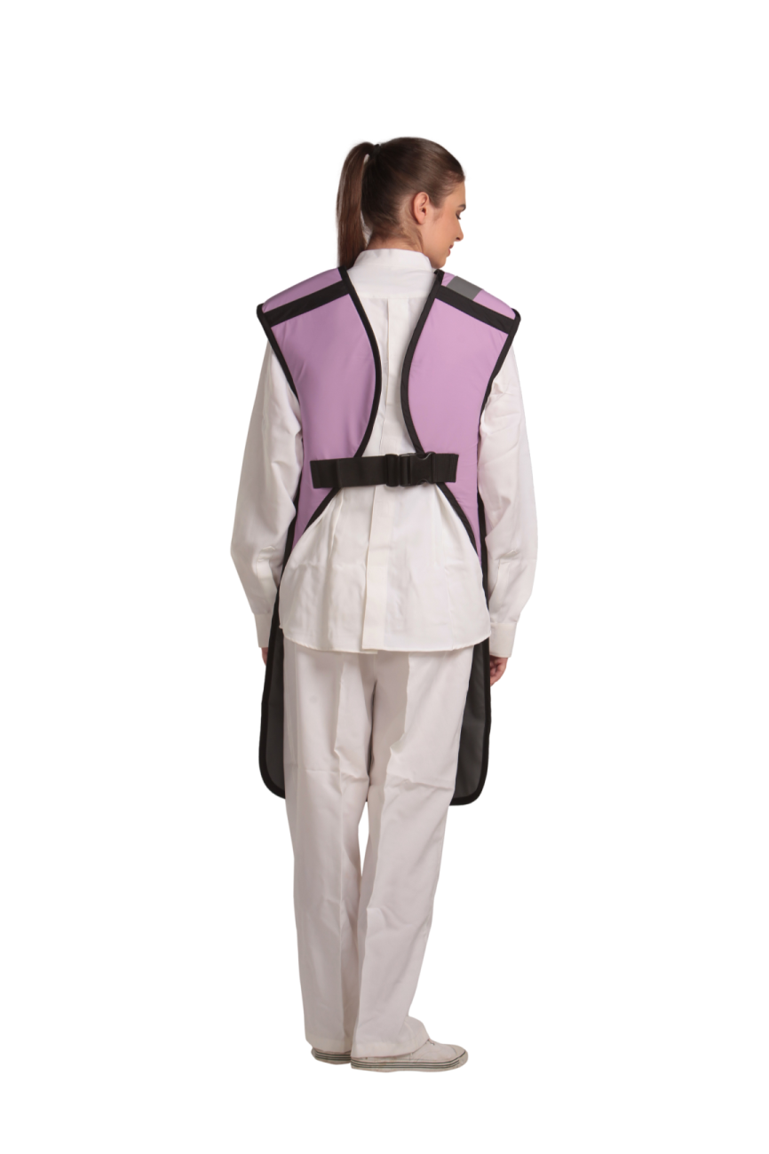 Back view of a female model wearing a lilac coat apron with flex back.
