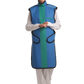 Full frontal view of a female model, her hands clasped together below her chest, wearing a coat apron with an integrated thyroid guard. The apron is royal blue in color with an ocean green center line and has closed velcro fasteners by the sides.