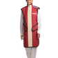 A full frontal view of a female model wearing a bordeaux red, beige center-lined coat apron with integrated thyroid guard.