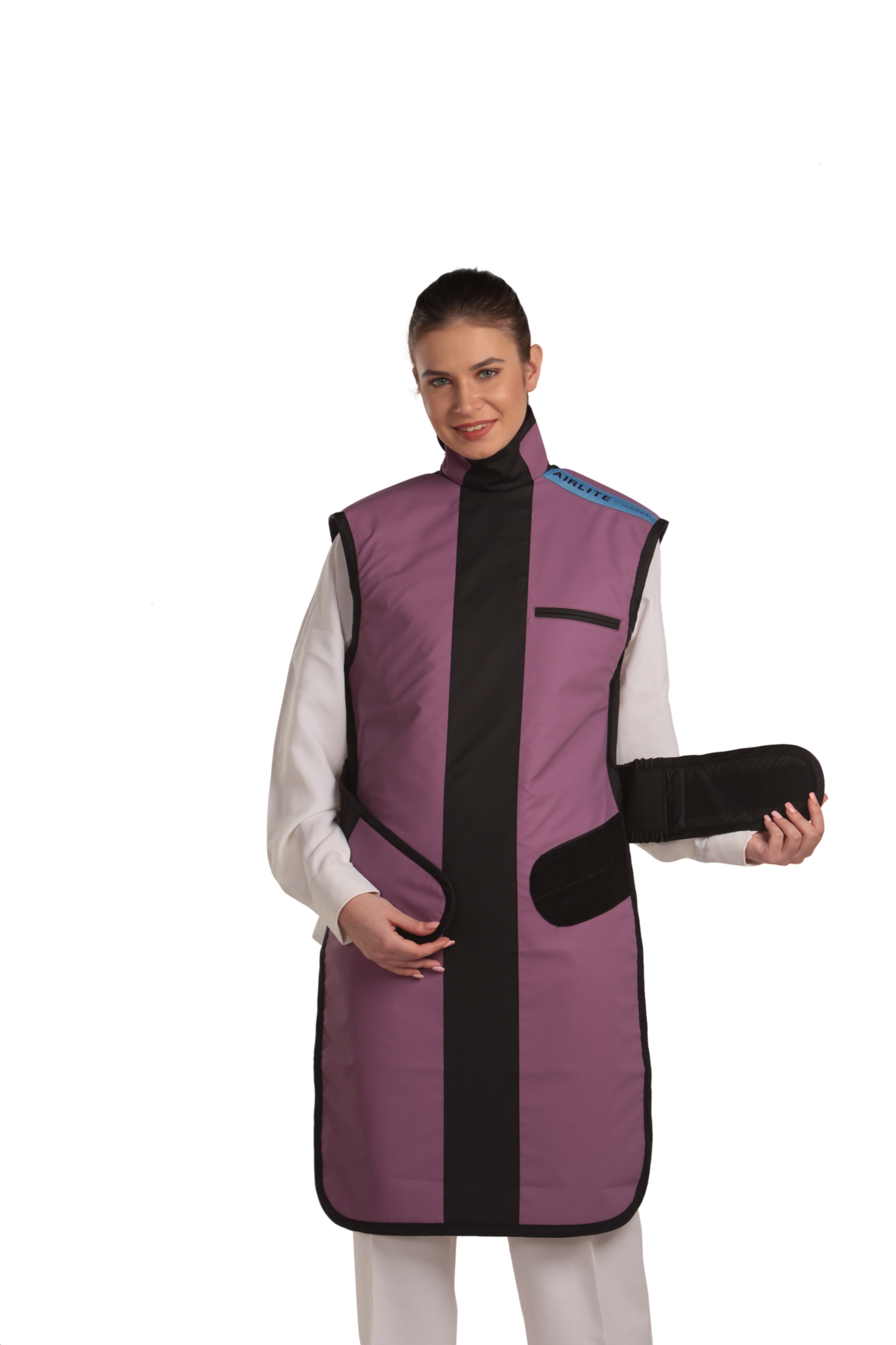 Full frontal view of a female model wearing a coat apron with integrated thyroid guard. The apron is mauve in color with a Jet black center line and has one closed velcro fastener on the right side and an open fastener on the left side