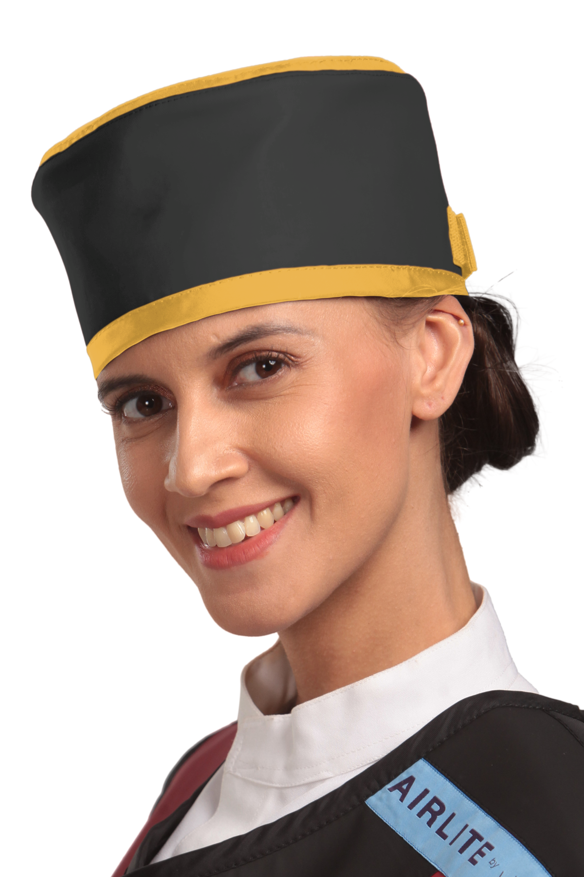 Up-close left-side frontal view of a female model wearing a radiation protection head shield. The head shield is Jet black with yellow-colored lines around the lower and upper edges.