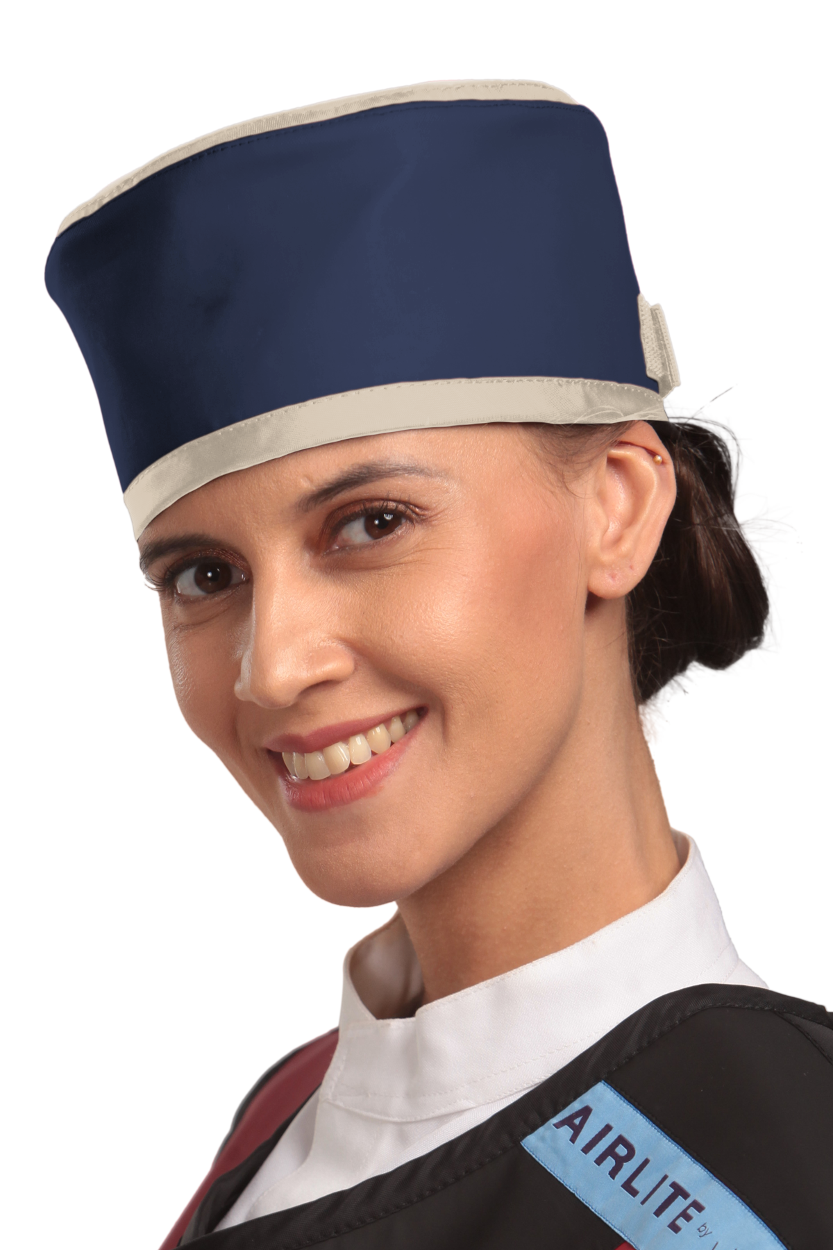 Up-close left-side frontal view of a female model wearing a radiation protection head shield. The head shield is Navy blue with beige-colored lines around the lower and upper edges.