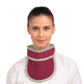 Frontal view of a female model wearing a Bordeaux red thyroid collar “Slim” lined with beige color around the outer edges.