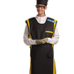 Full frontal view of a female model, her hands clasped together below her chest, wearing a radiation protection head shield, eyewear, medical gloves, and a coat apron with closed velcro fasteners by the sides. The apron is jet-black with yellow-colored lines by the edges.  