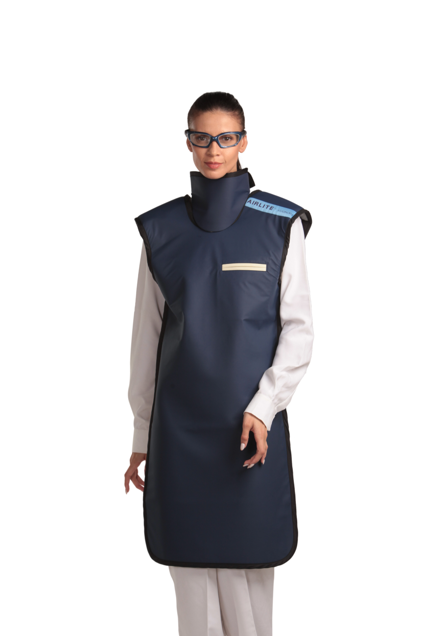 A full frontal view of a female model wearing a navy blue, beige-lined coat apron with integrated thyroid guard. 