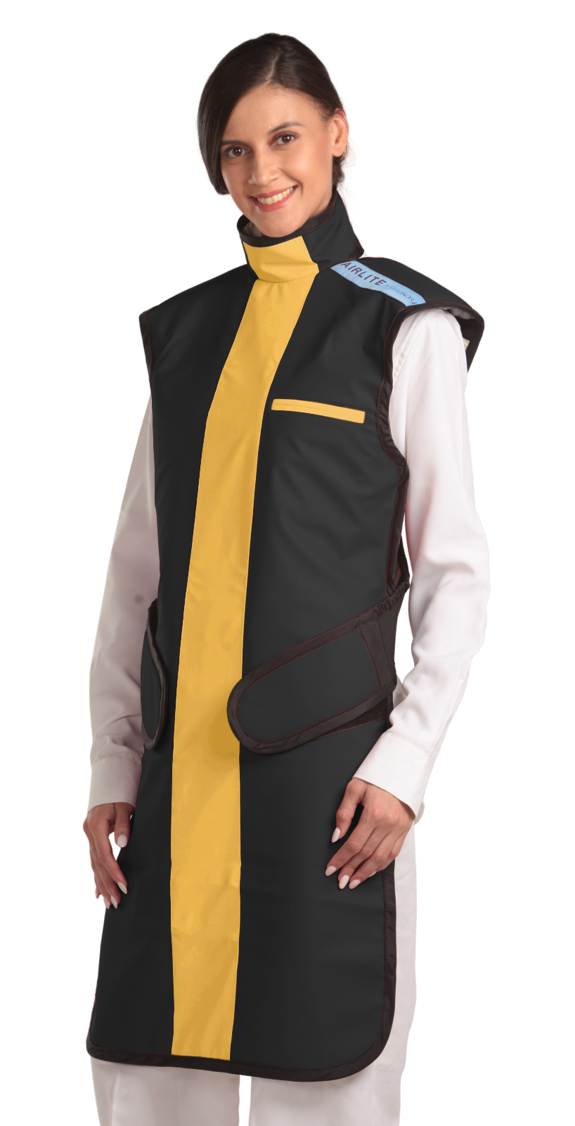 Frontal left-side view of a female model wearing a coat apron with an integrated thyroid guard. The apron is jet black with a yellow-colored center line and has velcro fasteners by the sides.